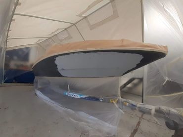Boat hull fibreglass construction workshop