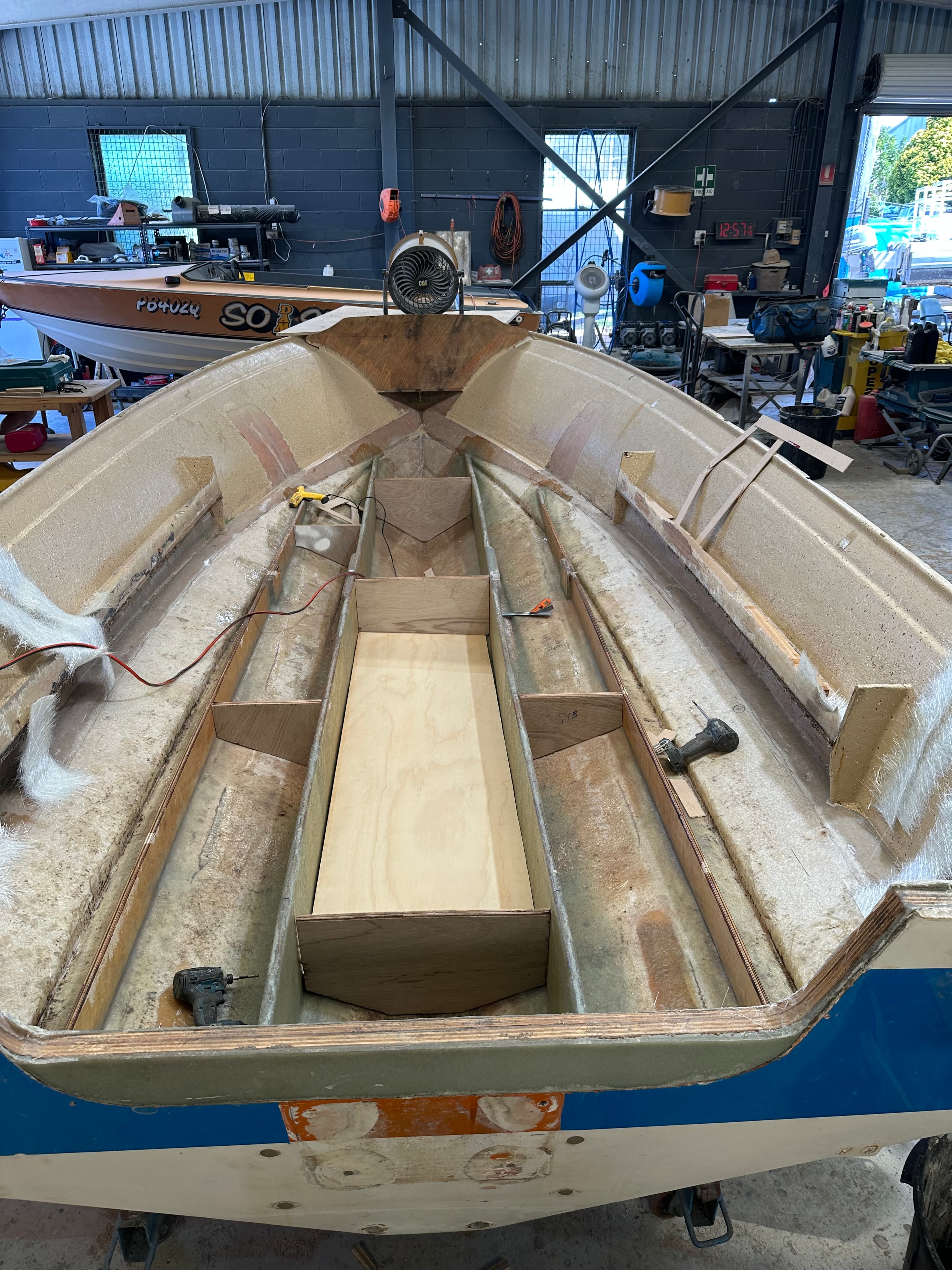 New timber framework and cabinetry being fitted inside hull