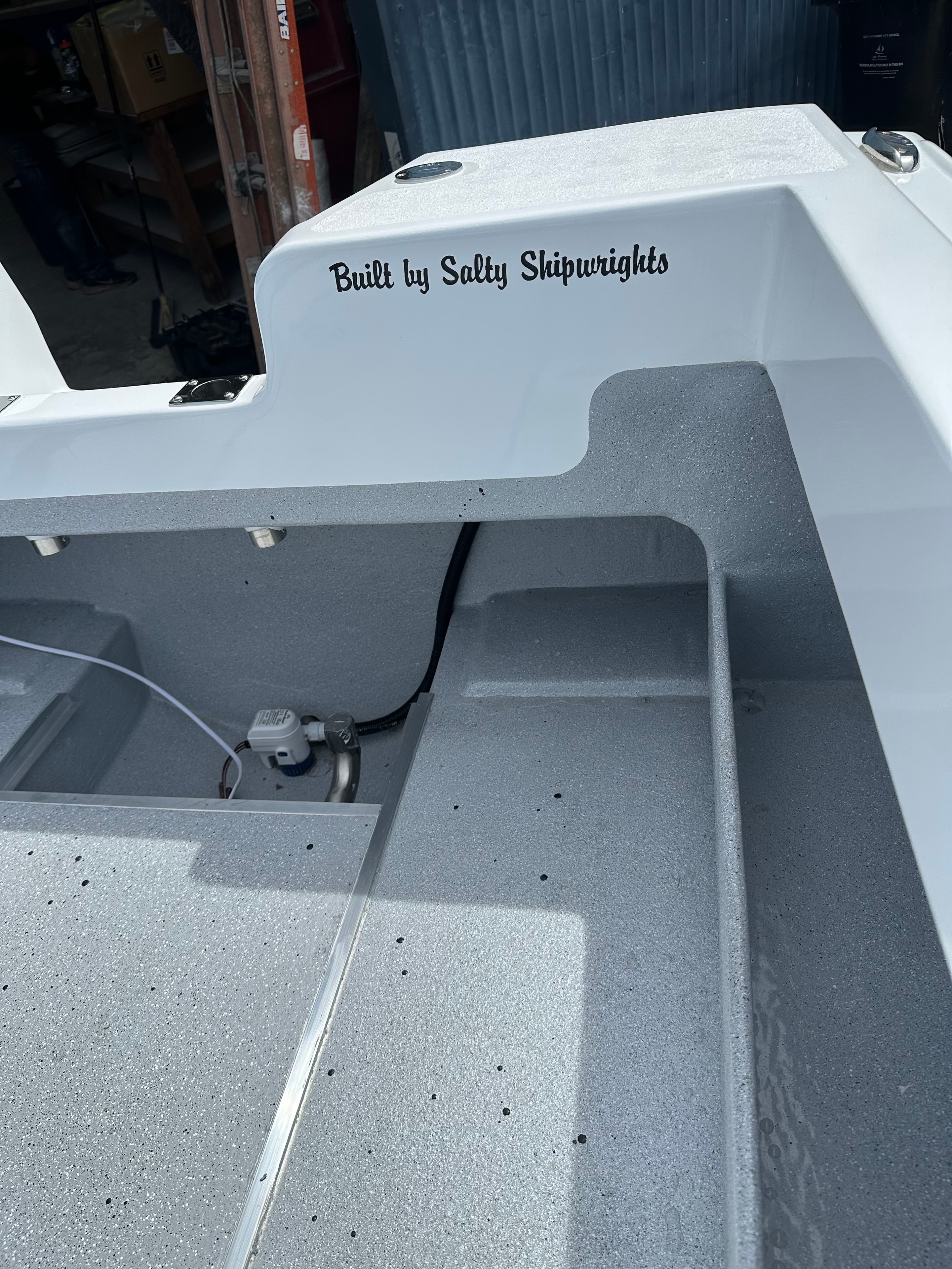 Built by Salty Shipwrights branding on finished galley compartment