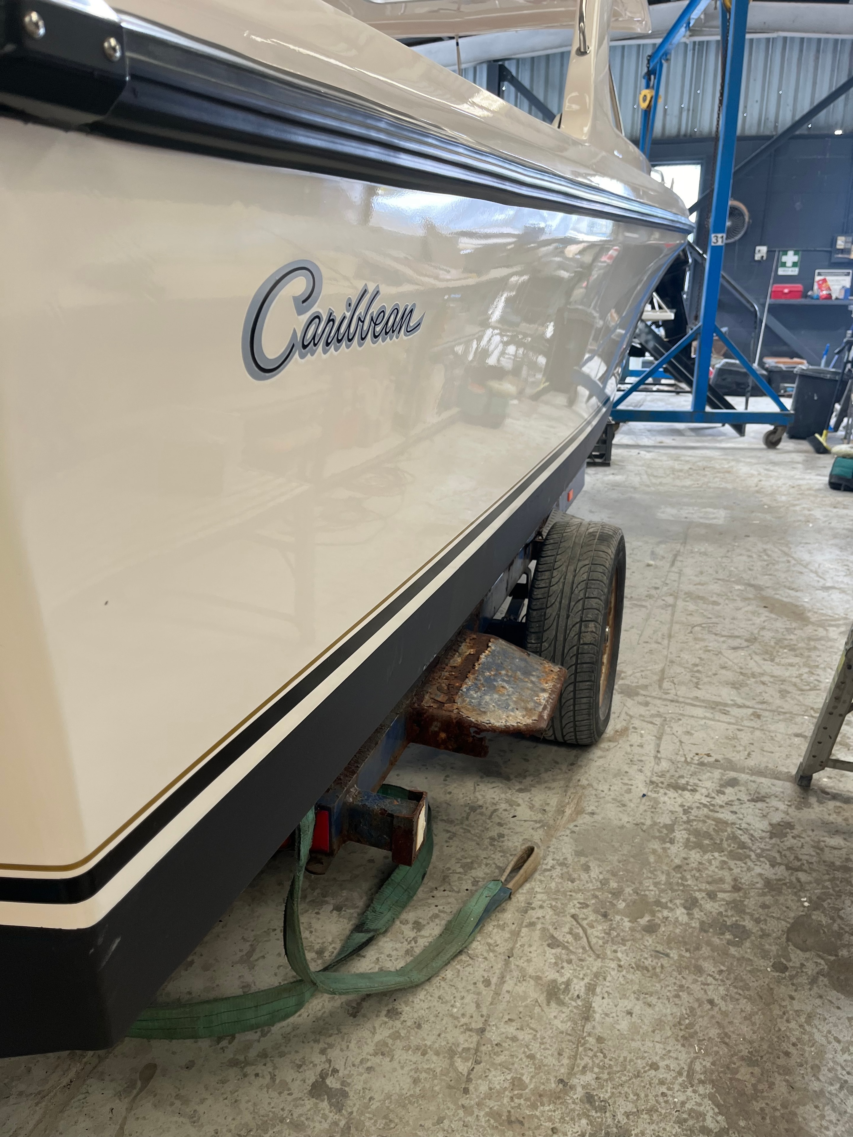 Caribbean boat hull gelcoat respray in workshop