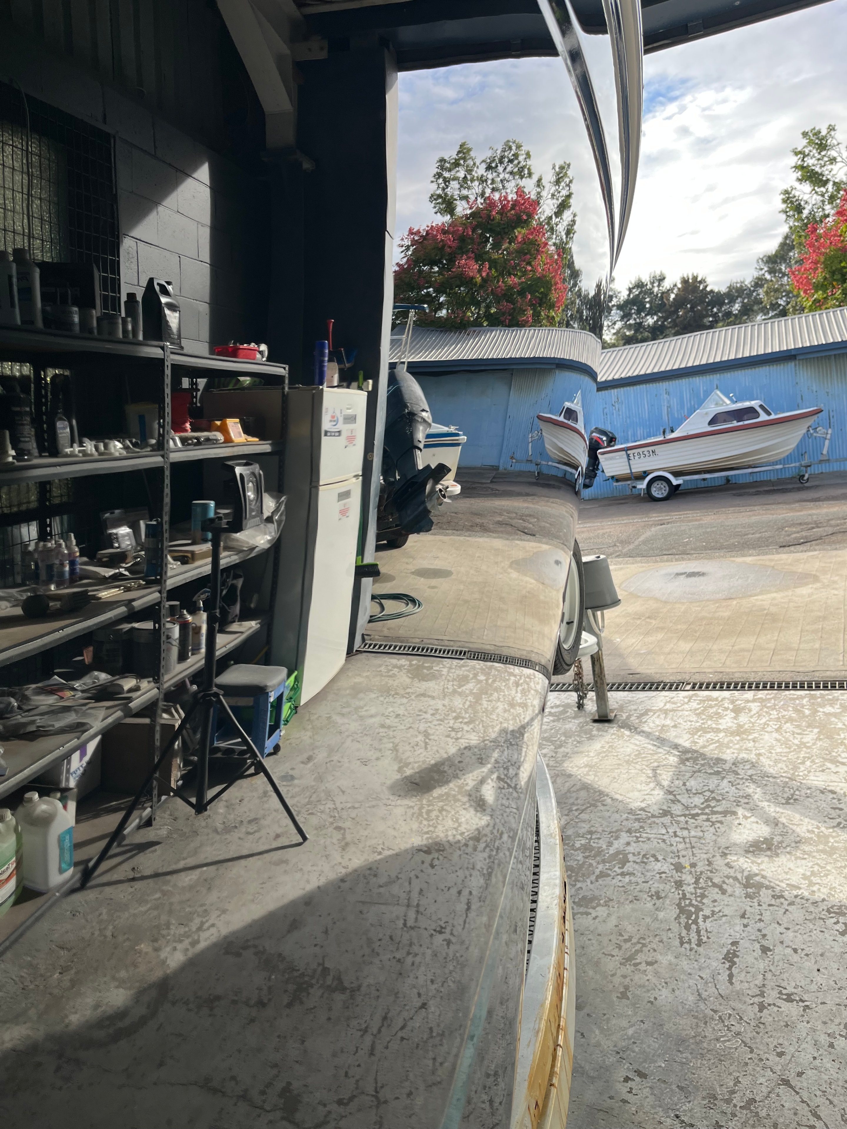 Workshop yard with boats awaiting respray work